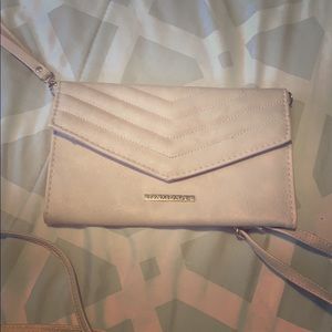 Selling this light pink Rampage bag